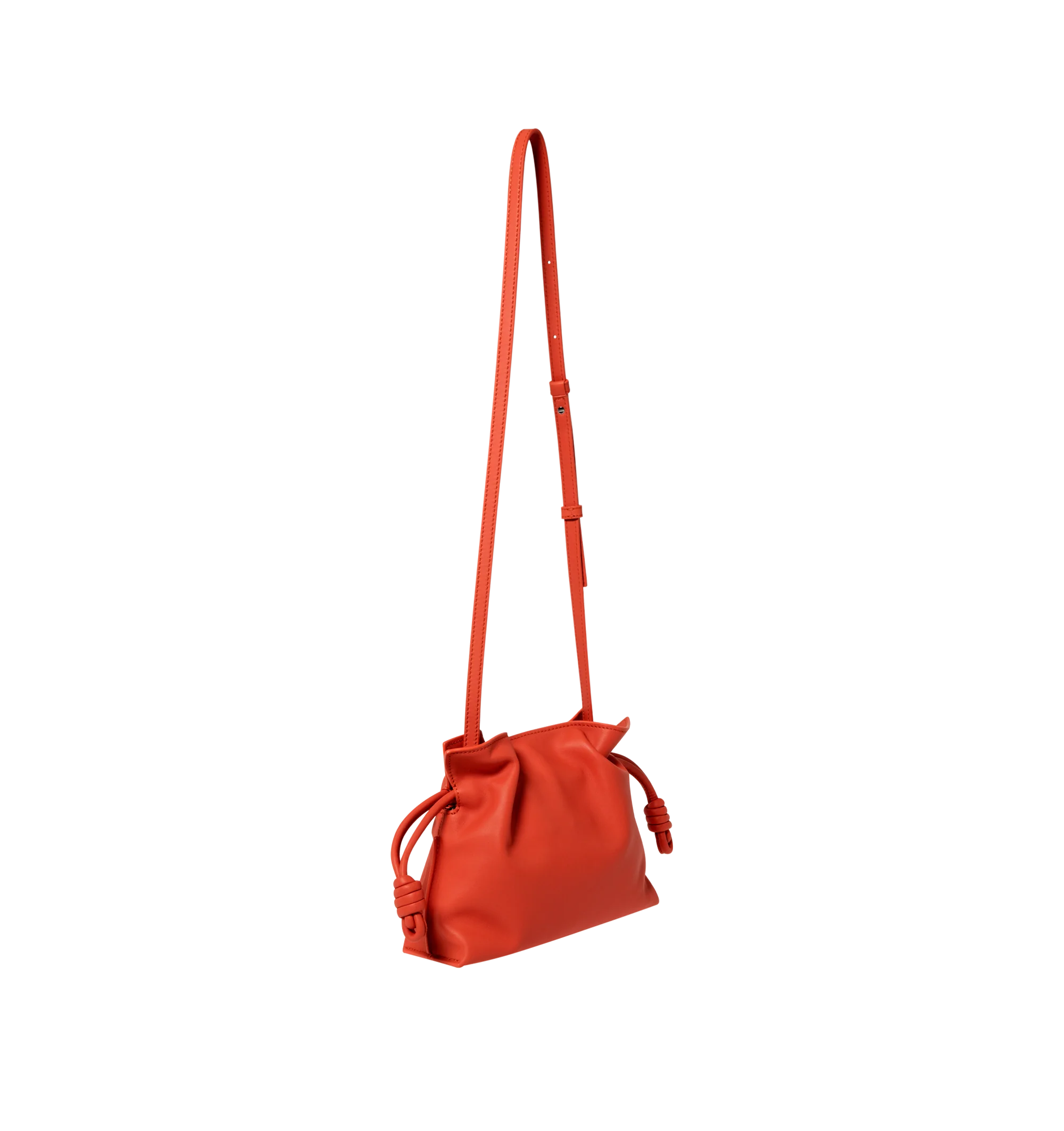 Image 2 of 3 - ORANGE - LOEWE Mini Flamenco Clutch in nappa calfskin featuring a soft and slouchy bag with a cinched closure and historical knot drawstrings, shoulder, crossbody or hand carry, detachable and adjustable strap, discreet magnetic closure, suede lining and embossed Anagram. Nappa calf. 18 cm x 23.9 cm x 9 cm. Made in Spain. 
