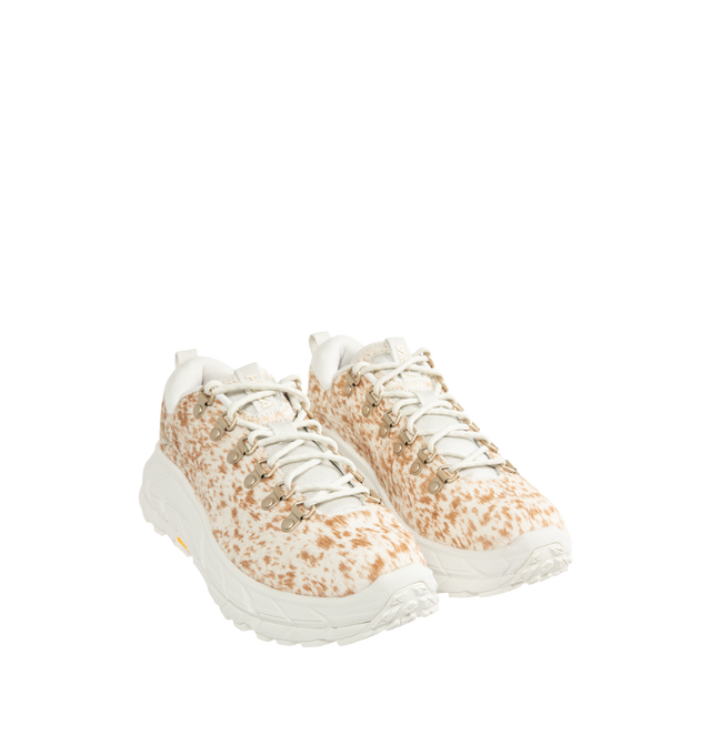 Image 2 of 5 - WHITE - HOKA Tor Summit+ Pony Hair Sneaker featuring pony hair leather upper, metal eyelets + hiking-style lacing system, Vibram Megagrip outsole for traction on varied terrain, cushioned midsole for long-wear comfort, pull tabs at heel and tongue for easy entry and ;ow-cut hiking silhouette.