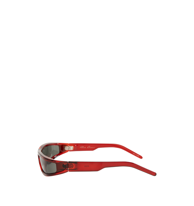 Image 2 of 3 - RED - Rick Owens Mens Rectangular Sunglasses feature a lightweight Rilsan nylon frame with red lenses. Designed with integrated nose pads, 100% UVA/UVB protection (Category 3), and include a leather storage pouch. Frame Material: Rilsan Nylon. Made in Italy. 