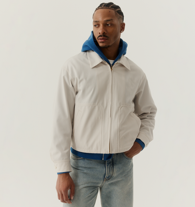Image 2 of 5 - WHITE - VISVIM Somer Swing Top featuring two side pockets, zipper closure, one inner pocket on left, pressed finish and graphic print on back. 62% wool, 38% silk. Made in Japan. 