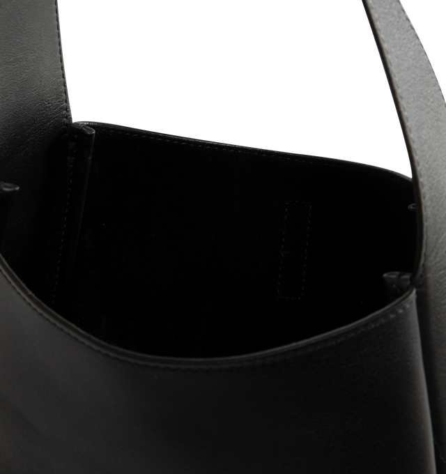 Image 3 of 3 - BLACK - Saint Laurent LE 5 7 small hobo in grained calfskin leather with suede lining. Featuring leather tab with small Cassandre, silver-toned hardware, interior zipper pocket and adjustable shoulder strap. Measures 23 X 22 X 8/5 cm with 21 cm strap drop. Made in Italy.