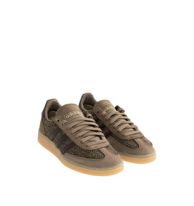 Image 2 of 5 - BROWN - ADIDAS Handball Spezial Sneaker featuring regular fit, laces, textile upper, leather lining, rubber outsole, Cold Cement construction, 3-Stripe branding, Harris Tweed textile and nubuck overlays. 