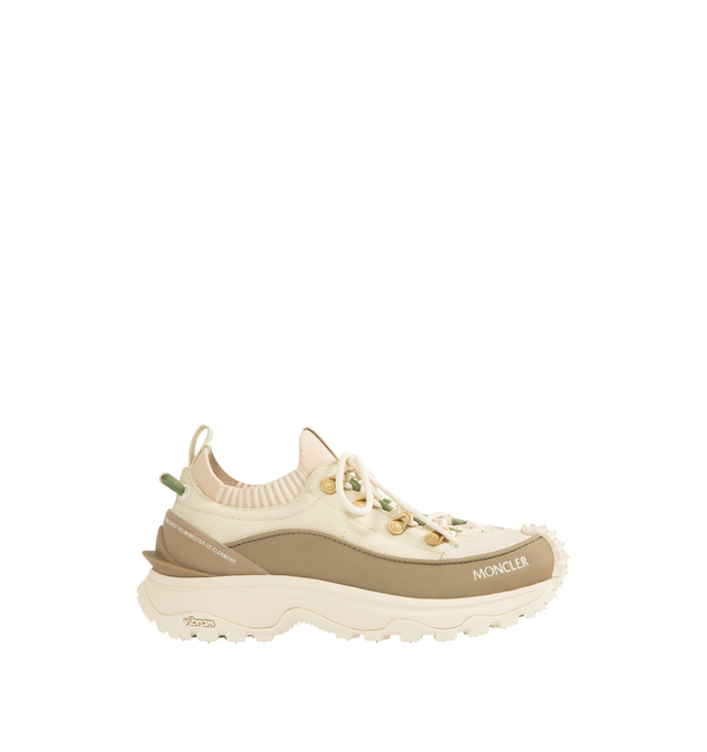 Image 1 of 5 - NEUTRAL - MONCLER Trailgrip Lite3 Sneakers featuring knit fabric, nylon fabric and textured PU upper, elastic fabric and mesh insole, lace-up, carbon sole, TPU spoiler, EVA midsole, special Vibram MEGAGRIP rubber compound tread and OrthoLite insole. 100% polyester. Lining: 100% polyamide/nylon. Sole: 100% elastodiene.