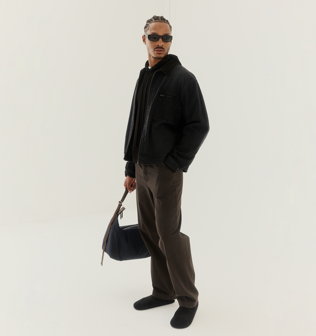 Image 3 of 6 - BLACK - THE ROW Hudson Slide featuring grained calfskin upper with rubber sole, slip-on styling, cushioned leather footbed, soft shearling with contoured footbed and rounded toe. Made in Italy.