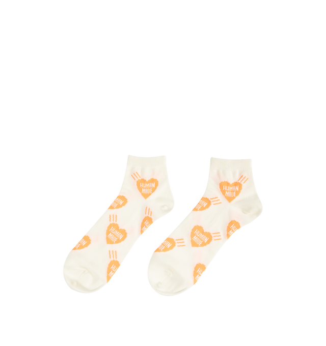 Image 2 of 2 - ORANGE - HUMAN MADE Heart Socks featuring short length, soft, comfortable cotton blend, all-over heart logo patter, ribbed top cuff and jacquard weave logo. 47% cotton, 20% nylon, 20% acrylic, 11% polyester, 2% spandex. 