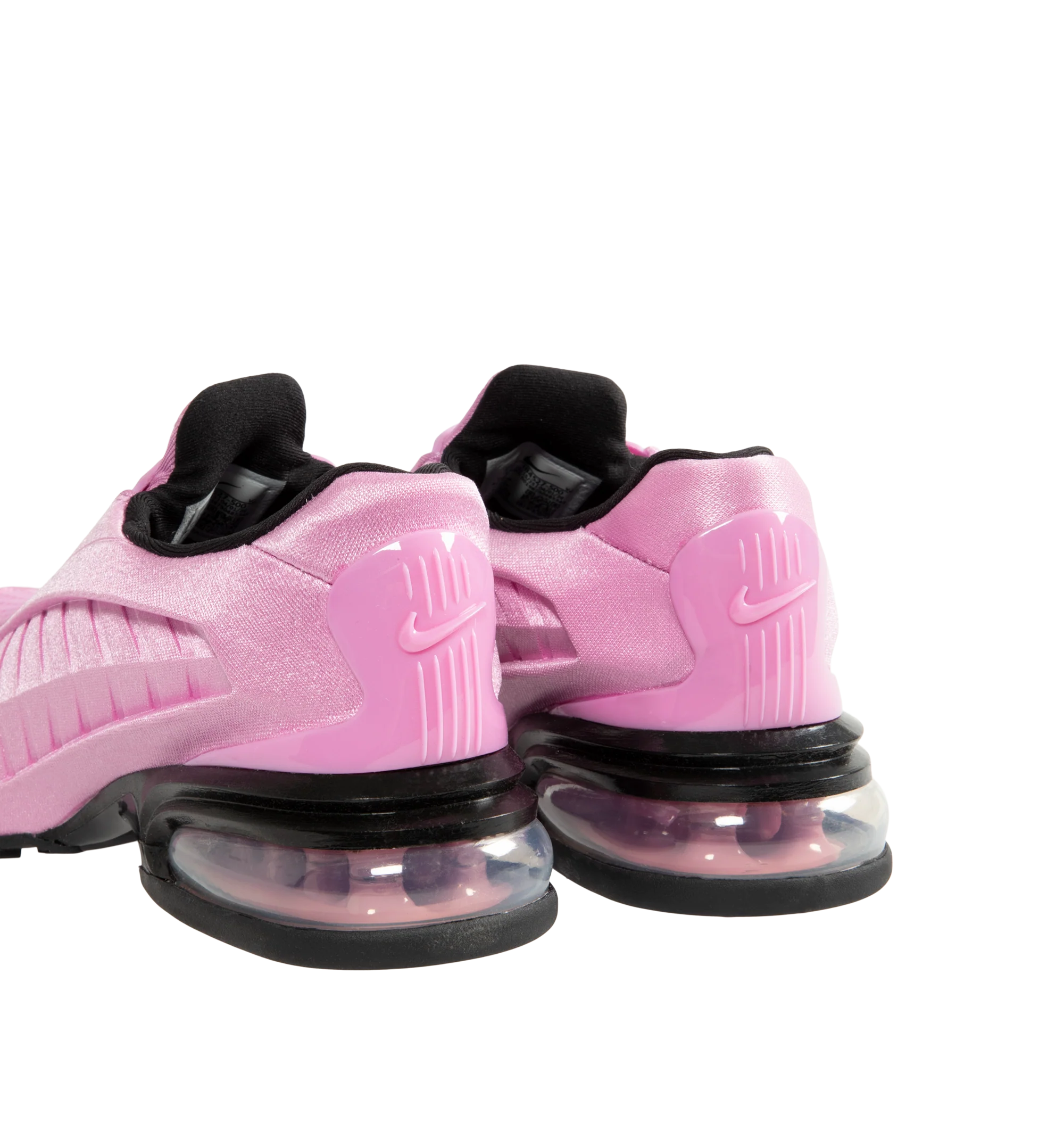 Image 3 of 5 - PINK - Nike Women's Air Max Dolce Shoes feature a laceless molded upper with an overlay cage and the distinctive Air Max silhouette. Designed for easy slip-on wear, the style is finished with visible Max Air cushioning in the heel for lightweight support and comfort. A foam midsole provides additional cushioning with every step. Midsole: Foam. Cushioning: Visible Max Air Unit. Closure: Slip-On.