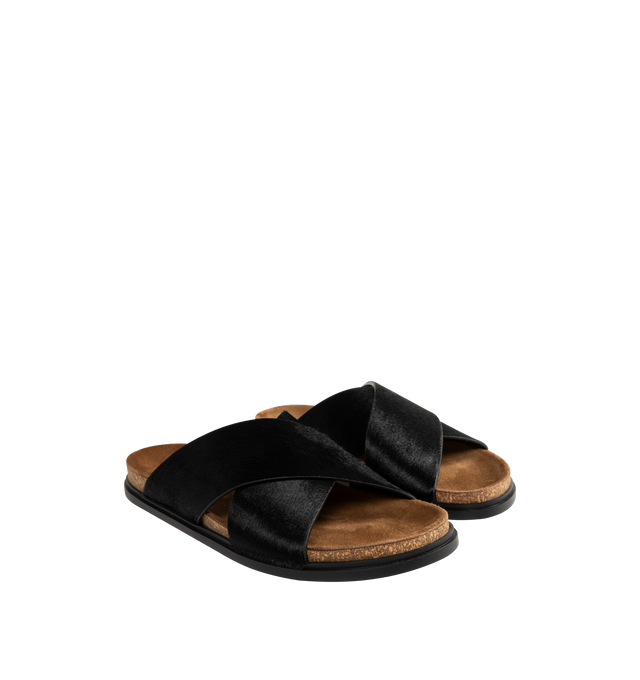 Image 2 of 4 - BLACK - The Row flat sandal in textured pony hair leather with wide overlapped upper straps, contoured cork footbed, and rubber sole. 100% Calfskin Leather. Made in Italy.