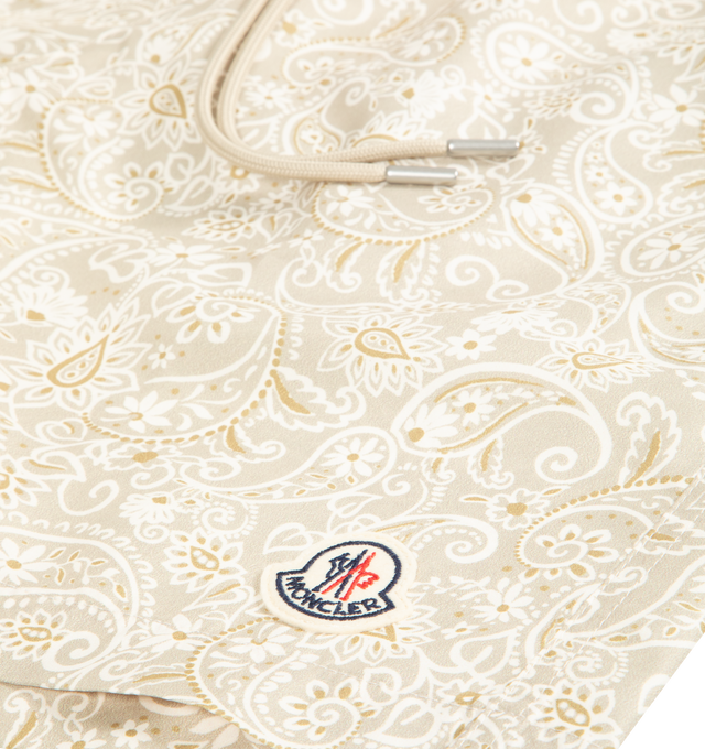 Image 2 of 2 - BROWN - MONCLER Paisley Print Swim Shorts featuring micro mesh lining, adjustable waistband, side pockets and back pocket with snap button closure. 100% polyester. 