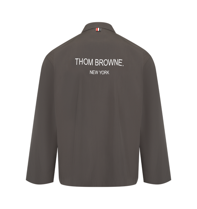 Image 2 of 3 - GREY - THOM BROWNE Light Memory Tech Sportcoat featuring front button closure, patch hand pockets with flap, unlined, logo print, signature striped grosgrain loop tab and packable. 76% polyester recycled, 24% polyester. Made in Italy. 