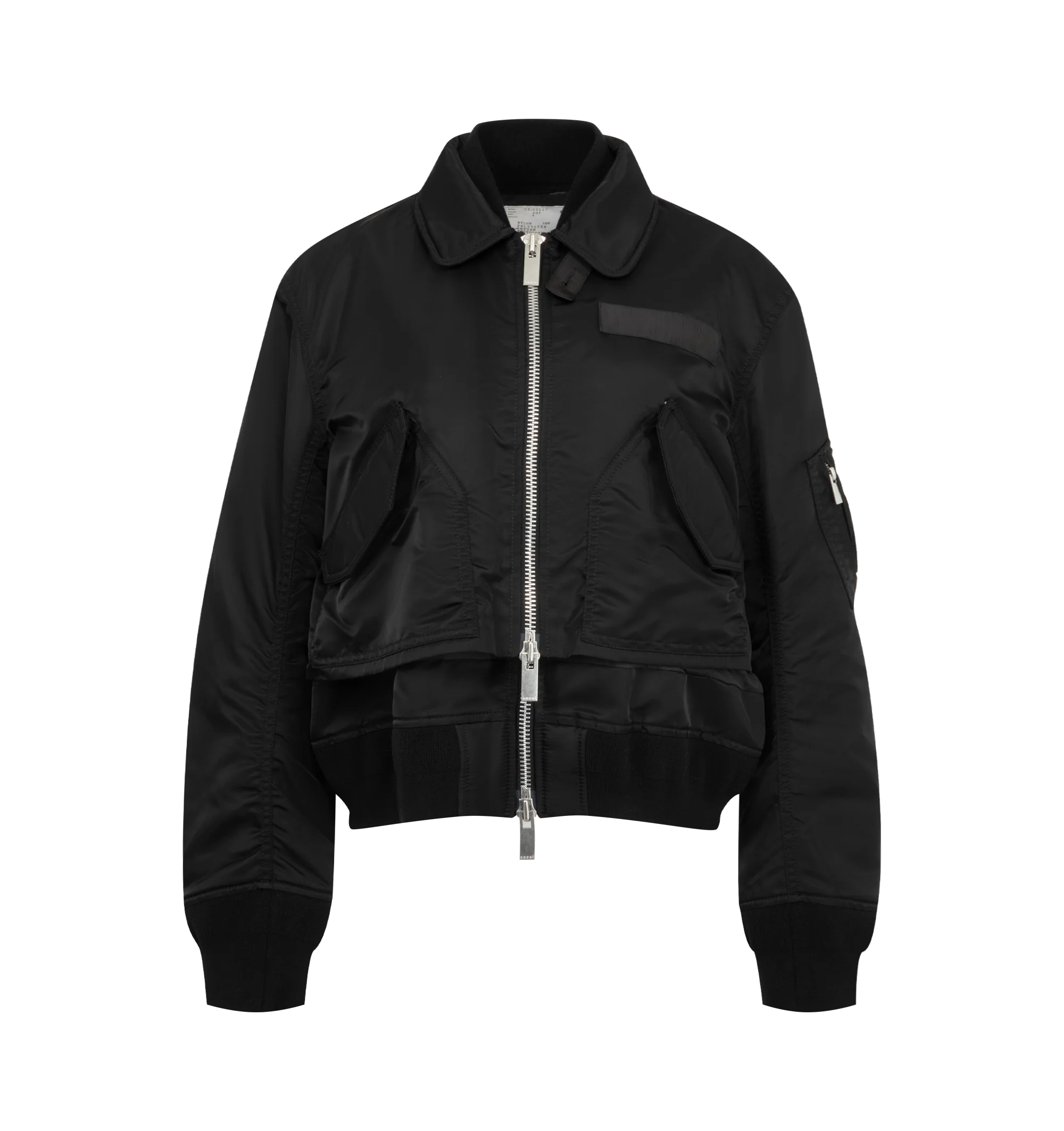 Image 1 of 4 - BLACK - Sacai Nylon Twill Blouson is crafted from nylon twill with lightweight padding. Features a blouson silhouette, mixed-media paneling, full lining, and modern utility-inspired construction. Outer: 100% Nylon; Parts: 55% Polyester, 44% Cotton, 1% Polyurethane; Lining: 100% Polyester; Filling: 100% Polyester. Made in Japan.