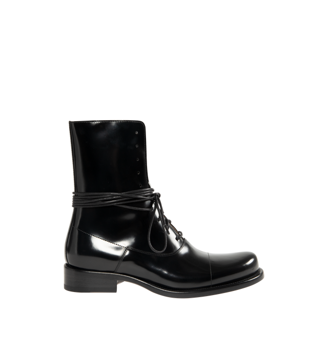 Image 1 of 4 - BLACK - THE ROW Kai Lace Up Boot featuring lace-up ankle boot in glossy calfskin leather with elongated round toe, extended leather sole and stacked leather heel. 100% calfskin leather. Leather sole. Made in Italy.