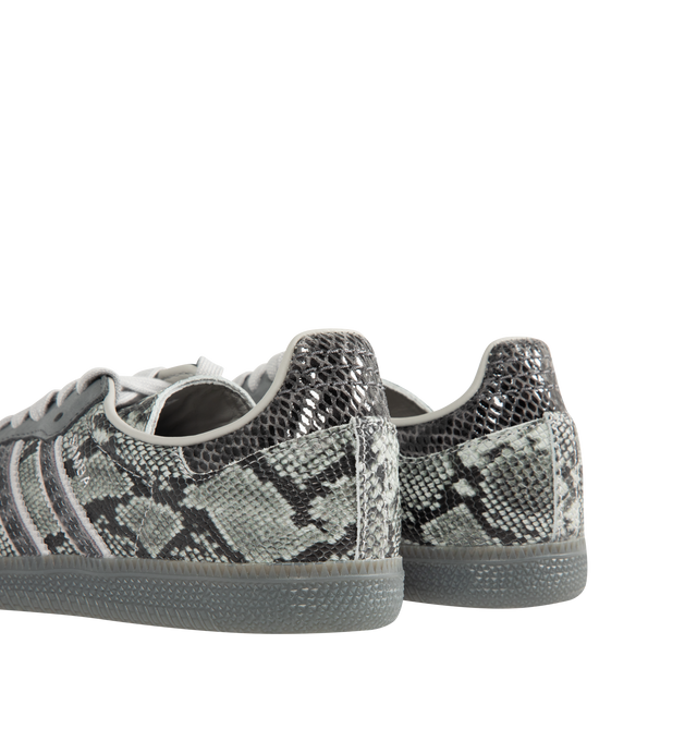 Image 3 of 5 - GREY - Adidas Men's Samba OG Snake-Effect Sneakers are crafted from calf leather. Features a snake-effect finish, round toe, lace-up closure, signature 3-Stripes, logo-print tongue, branded heel counter, and flat rubber sole. Upper: Calf Leather; Lining: Calf Leather; Sole: Rubber. Made in Vietnam.