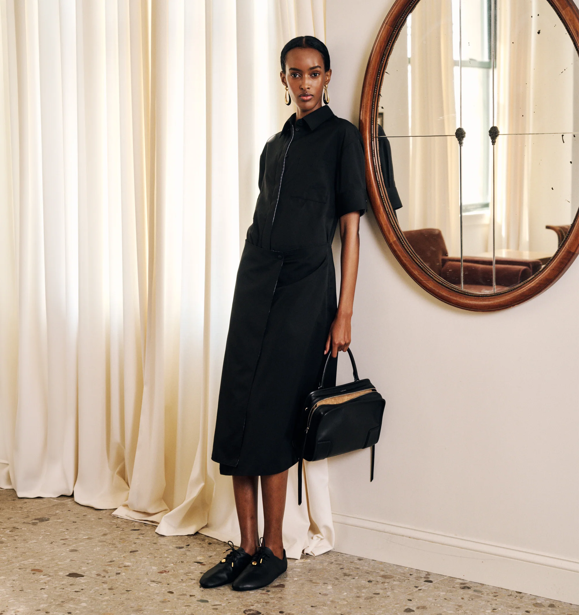 Image 6 of 6 - BLACK - Loewe Womens Nappa Calf Lace-Up Shoes are crafted from nappa calfskin. Features a lace-up closure, extra padding, asymmetric toe shape, tonal laces with metallic tips, metallic Pebble with engraved Anagram detail on the bottom lace, lambskin lining, printed LOEWE insole, and injected rubber outsole with cut-out Anagram signature. Main Material: Nappa Calf. Made in Italy. 