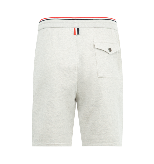 Image 2 of 3 - GREY - THOM BROWNE Pique Loopback Sweat Shorts featuring french terry shorts, drawstring at striped rib-knit waistband, three-pocket styling and logo patch at front cuff. 100% cotton. Made in Japan.
