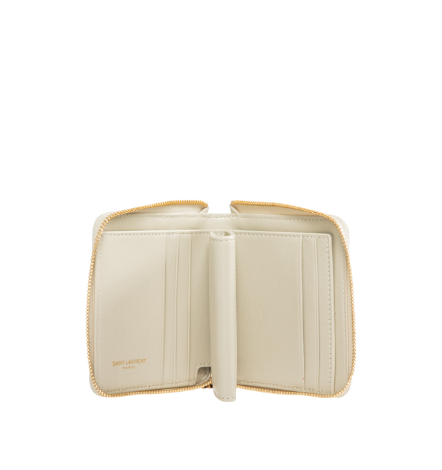 Image 3 of 3 - WHITE - SAINT LAURENT Bijou Compact Wallet featuring jewelry zip pull, diamond-quilted topstitching, gold-tone hardware, zip closure, six card slots, one bill compartment and one coin compartment. 4.1" x 3.5" x 0.8". Calfskin. Made in Italy.