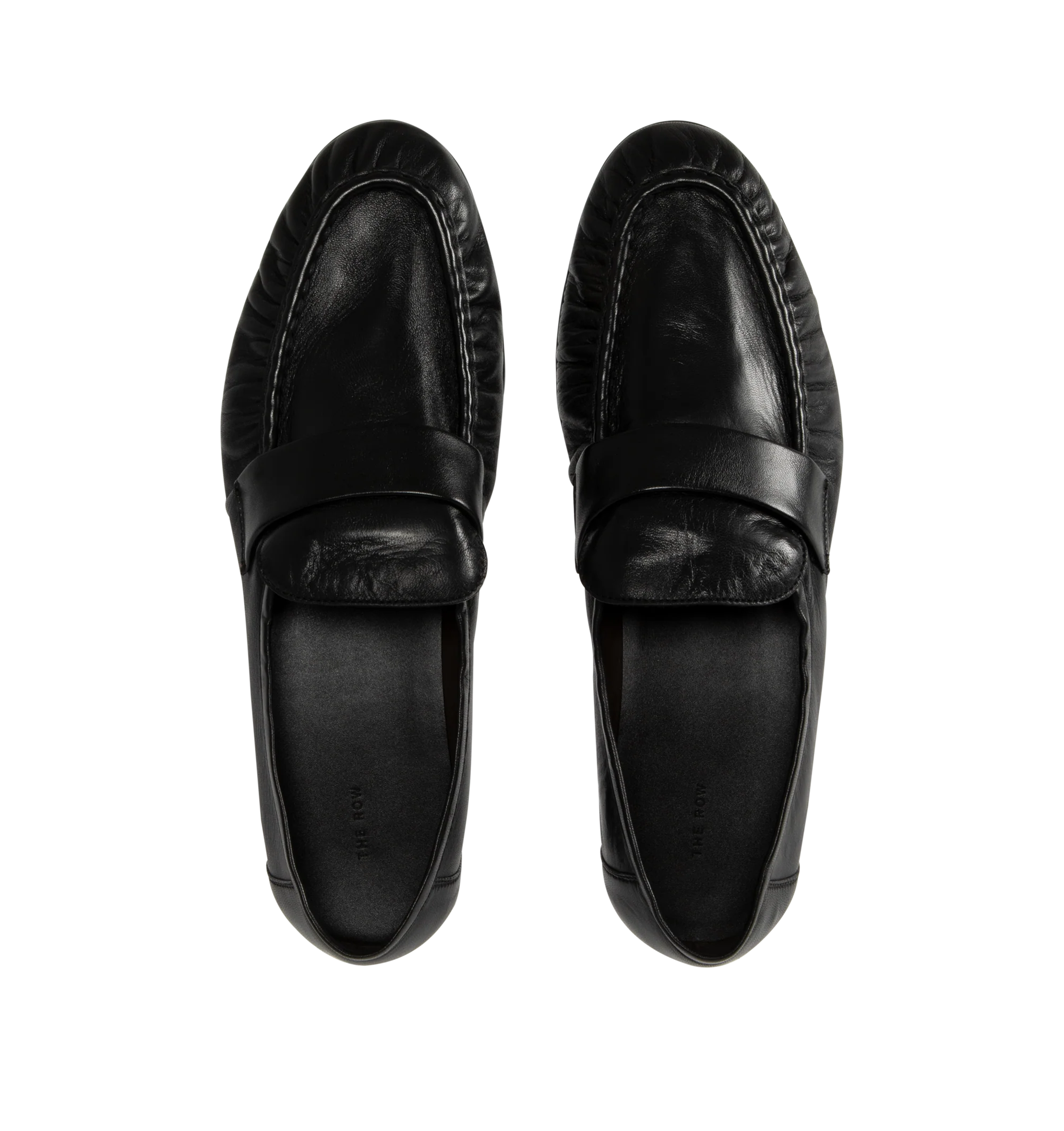Image 4 of 4 - BLACK - THE ROW Soft Loafers featuring polished eel leather loafers, topstitching and gathering at moc toe, strap at vamp, logo stamp at footbed, suede lining, stacked leather block heel and hand-painted leather sole with rubber injections. Heel: H1". Leather. Made in Italy.