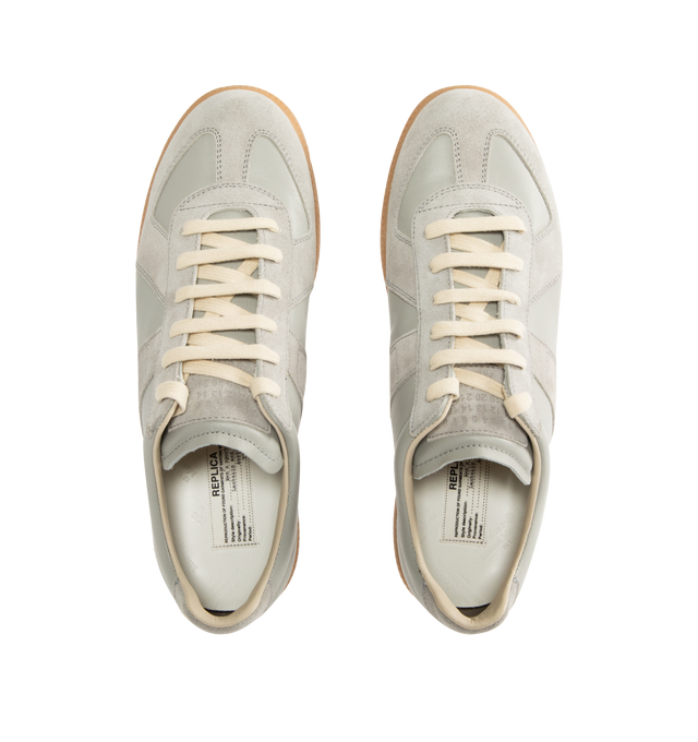 Image 5 of 5 - GREY - MAISON MARGIELA High Quality Luxury Sneakers featuring lace-up sneakers in buffed nappa calfskin and calfskin suede, contrasting sole, Maison Margiela logo label on the tab, internal High Quality Luxury label, internal elastic and all-over Maison Margiela logo insole. 100% calf leather. Sole: 100% rubber. Made in Italy.
