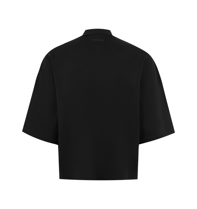 Image 2 of 2 - BLACK - FEAR OF GOD ESSENTIALS Signature 90s Cropped Polo featuring medium-weight cotton/poly pique knit, a 90s fit with oversized proportions, 3/4 sleeves, and cropped length, embroidered Essentials signature logo on the chest and Essentials signature label at the back collar. 80% cotton, 20% polyester.