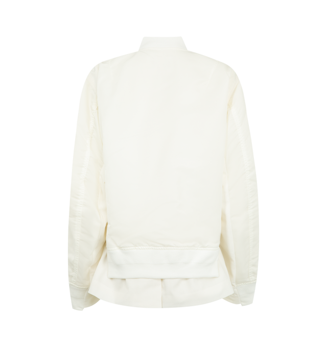 Image 2 of 3 - WHITE - SACAI Nylon Twill Wool Suiting Jacket featuring nylon satin bomber jacket, paneled construction, rib-knit stand collar, two-way zip closure, press-stud tabs at chest, cropped asymmetric hem and utility pocket at sleeve. Made in Japan.