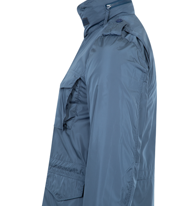 Image 4 of 4 - BLUE - ASPESI Minifield Shell Jacket featuring front press-stud and zip fastening, epaulettes, long sleeves with touch-strap cuffs, two chest patch pockets, and two front flap pockets, internal drawstring fastening at waist and straight hem with an elasticated-drawstring. 100% polyamide.