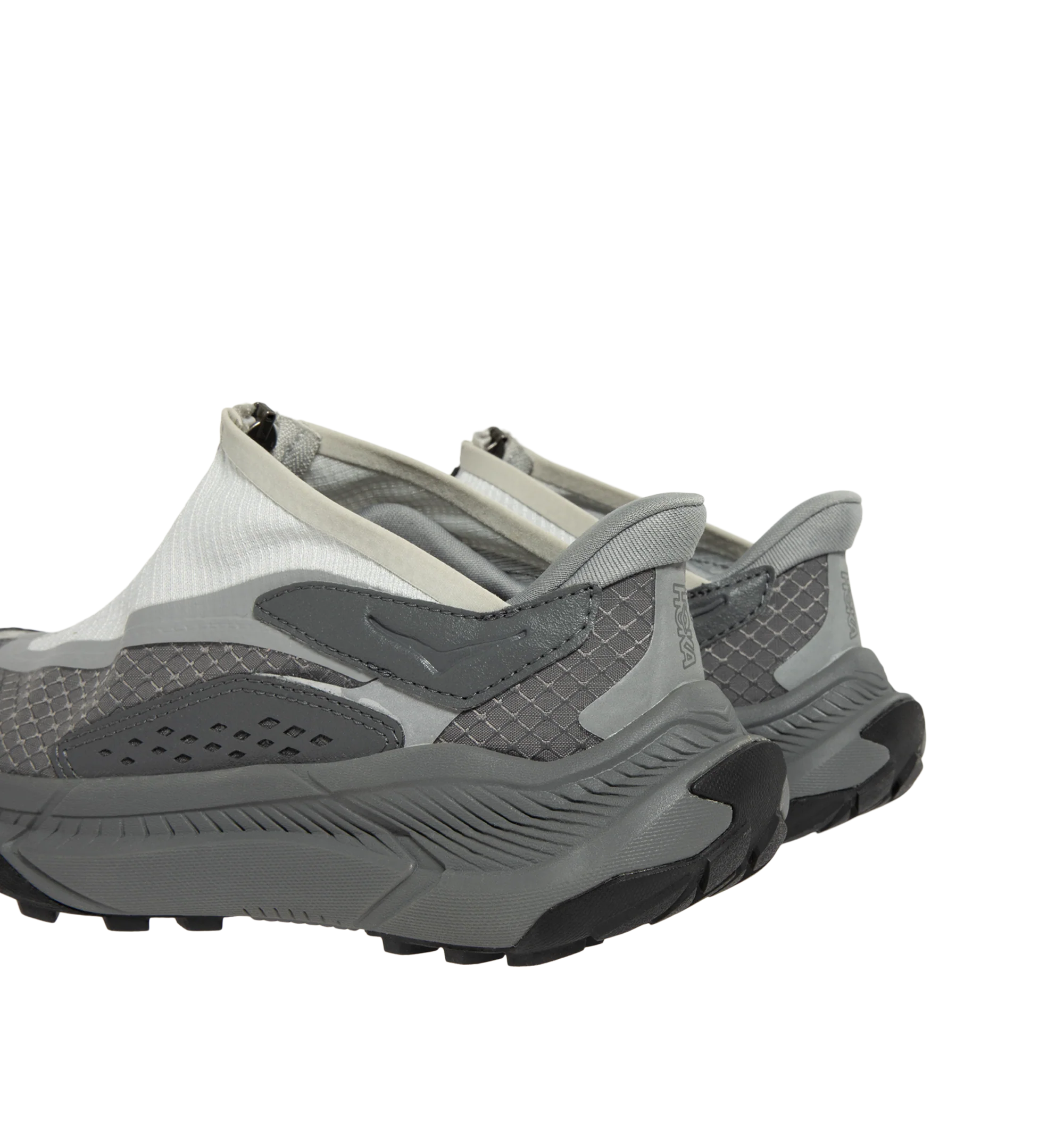 Image 3 of 5 - GREY - Hoka Project Transport Sneakers feature a shrouded ripstop upper with textured synthetic overlays for lightweight durability and a sleek, modern look. Designed for everyday wear, these performance sneakers include a quick-lace system with a zippered shroud, reflective details, signature HOKA cushioning, and a Vibram Ecostep outsole for reliable traction and lasting comfort. Main Material: Ripstop Textile and Synthetic. Sole: Vibram Rubber. Made in Vietnam.