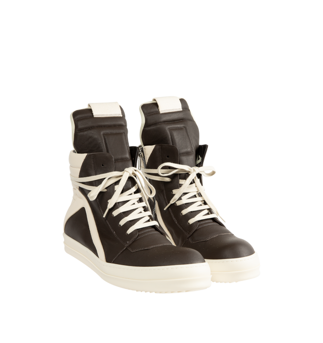 Image 2 of 5 - MULTI - Rick Owens Mens Geobasket High-Top Sneakers feature a full-grain cow leather upper. Designed with an above-ankle silhouette, extended tongue with webbing pull tab, signature geometric paneling, padded back counter, contrast laces, inner ankle zip closure, and shark-tooth thermoplastic rubber outsole. Upper: 100% Cow Leather; Lining: 100% Calf Leather; Insole: 100% Calf Leather; Outsole: 100% Thermoplastic Rubber. Sole Height: 3.5 cm. Made in Italy. 
