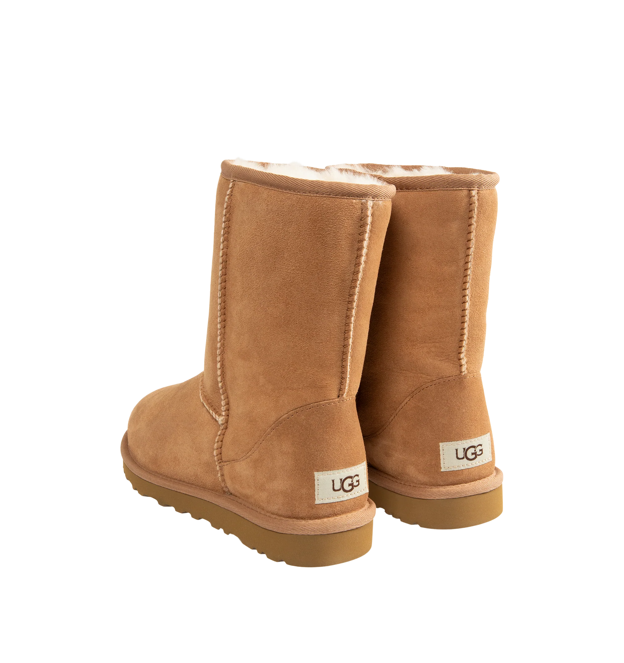 Image 3 of 4 - BROWN - UGG Men's Classic Short Boots are crafted from premium suede and feature the brand's iconic mid-calf silhouette with a soft sheepskin lining and cushioned footbed for signature warmth and comfort. These designer boots combine timeless style with lightweight cushioning and a durable outsole, making them an everyday cold-weather essential. Main Material: Suede. Lining: Sheepskin. Sole: Durable Rubber. 