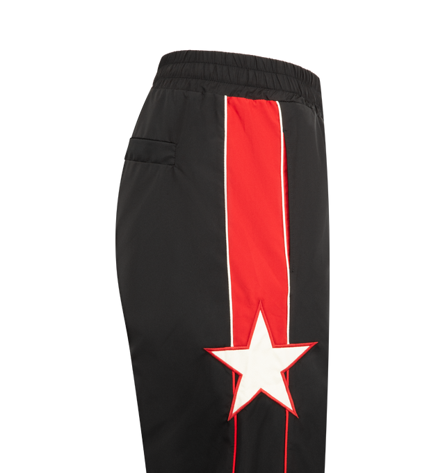 Image 3 of 3 - BLACK - AMIRI Sport Track Pant featuring drawstring closure, 3-pocket styling, embroidered details and lightweight ripstop fabric. 100% polyester. Made in Italy.