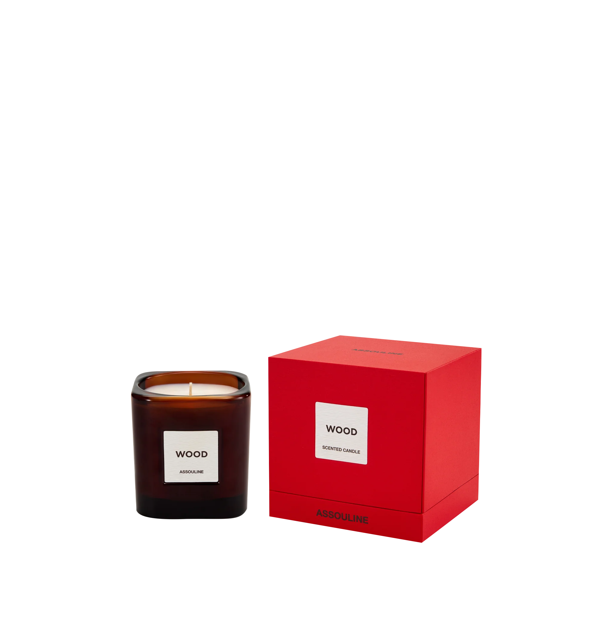 Image 2 of 3 - BROWN - Assouline Library Candle Wood is a luxury scented candle that captures the warm, inviting ambiance of a wood-paneled library with a refined fragrance blending orange bitters, spice, black currant, hyacinth, smoky exotic woods, and amber. Housed in a heavyweight amber glass vessel with a textured paper label, this designer candle is crafted from a premium soy, coconut, and paraffin wax blend for a clean, even burn and exceptional scent throw. Top Notes: Orange Bitters, Spice. Heart No