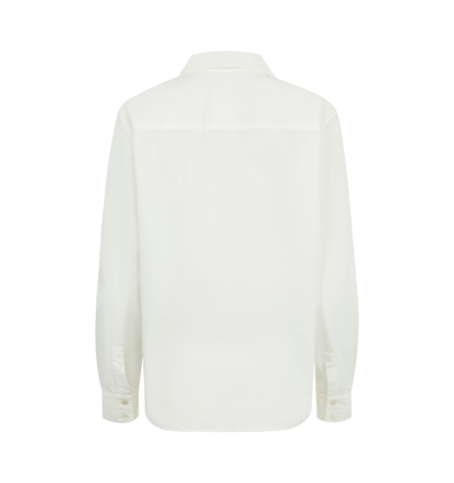 Image 2 of 2 - WHITE - THE ROW Sadie Shirt featuring classic button-up shirt in smooth sea island cotton poplin with slim back yoke and exposed front button placket. 100% cotton. Made in Italy.