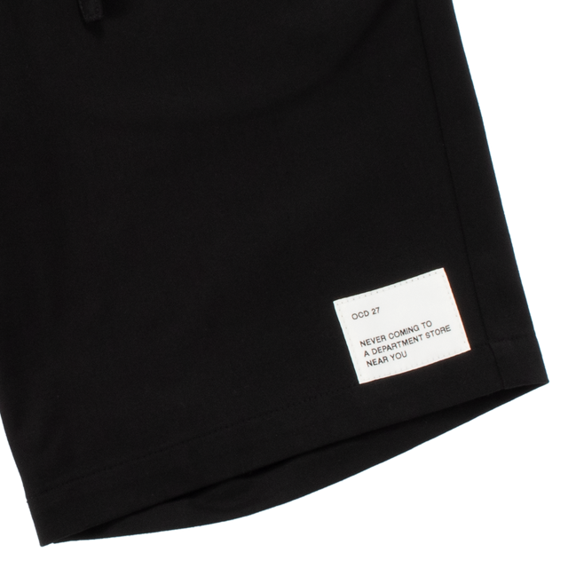 Image 4 of 6 - BLACK - OCD 27 Drawstring Bermuda Shorts featuring elastic waist, button fly, drawstring, back patch pocket and logo patch on leg. Fabric sources from Japan. 100% cotton.  