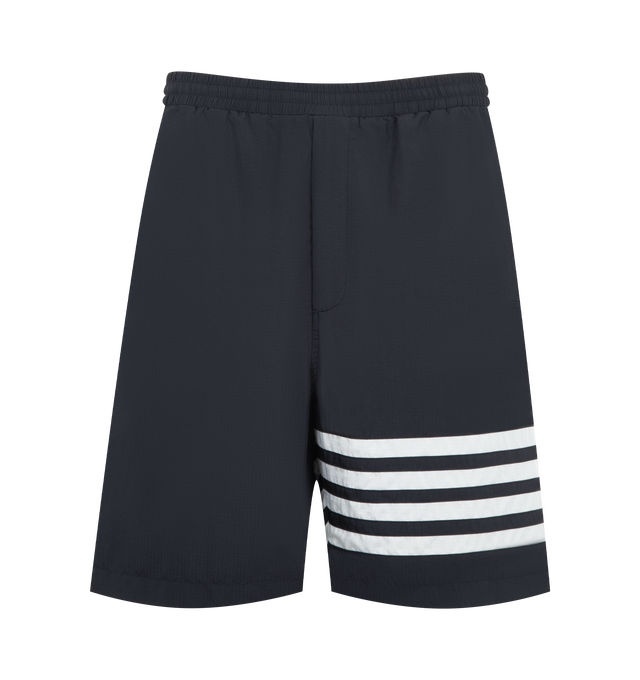Image 1 of 3 - BLUE - Thom Browne Mens Track Shorts are crafted from shiny ripstop fabric. Feature a relaxed fit, elasticized drawstring waistband with signature RWB aglets, zip fly, welt hand pockets, welt back pocket, mesh lining, engineered 4-bar detailing, and signature striped grosgrain loop tab. Main Material: 81% Polyamide, 19% Polyester; Lining: 100% Polyester. Made in Italy.