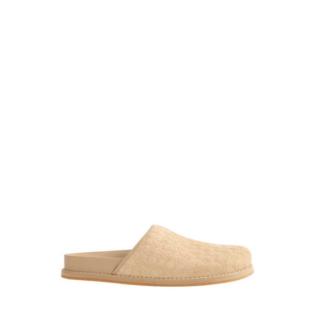 Image 1 of 4 - NEUTRAL - Amiri Mens Clog Slides are crafted from embossed suede leather material. Feature a closed upper, tone-on-tone engraved monogram motif, tapered wraparound construction, and flat rubber outsole with a lightly lugged tread. Upper: Suede Leather; Outsole: Rubber. Made in Vietnam.