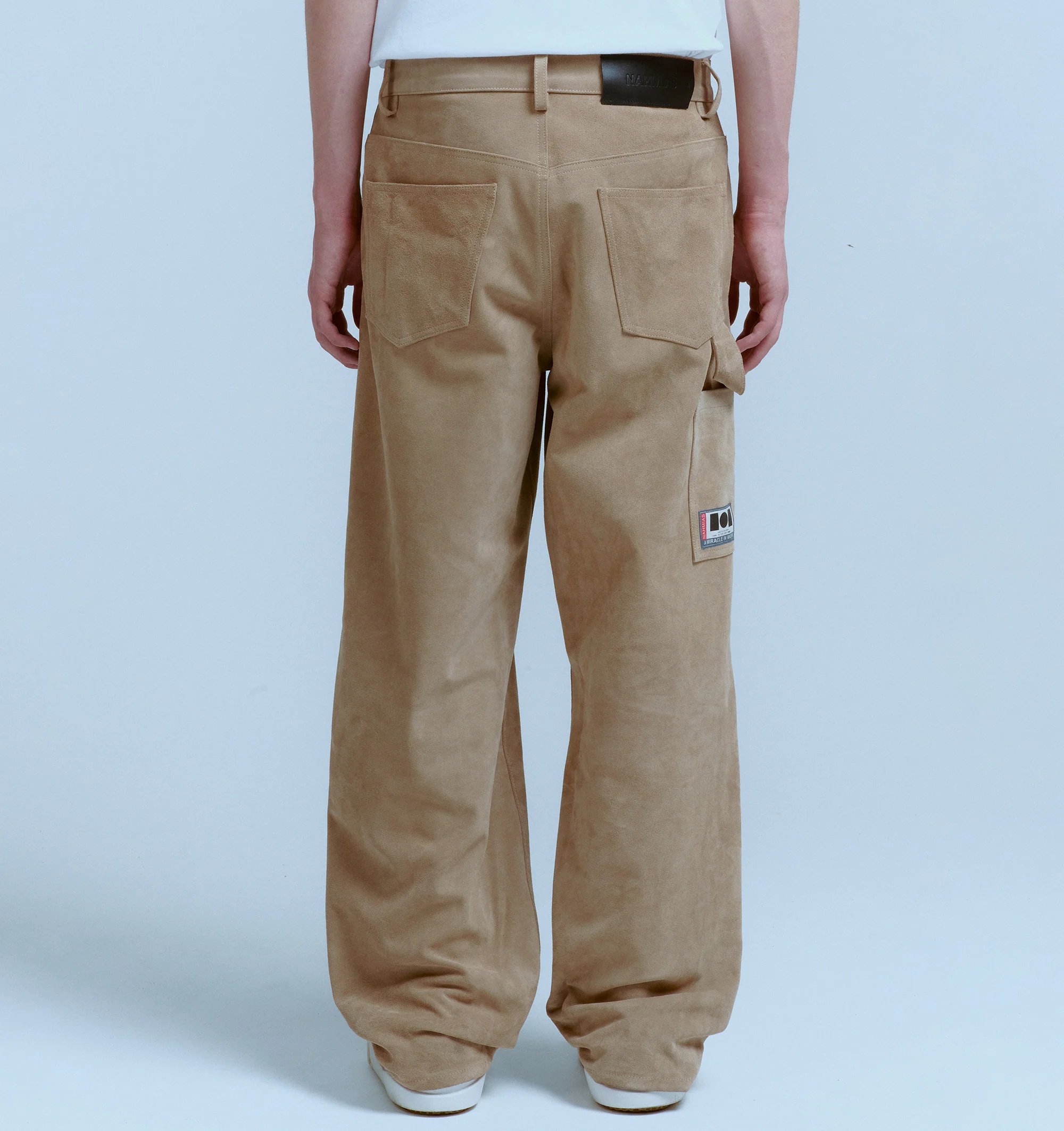 Image 3 of 5 - BROWN - NAHMIAS Suede Baggy Carpenter Pant featuring button zip closure, belt loops at waist, 5 pocket style with carpenter pocket at outseam and hammer loop. 100% leather.