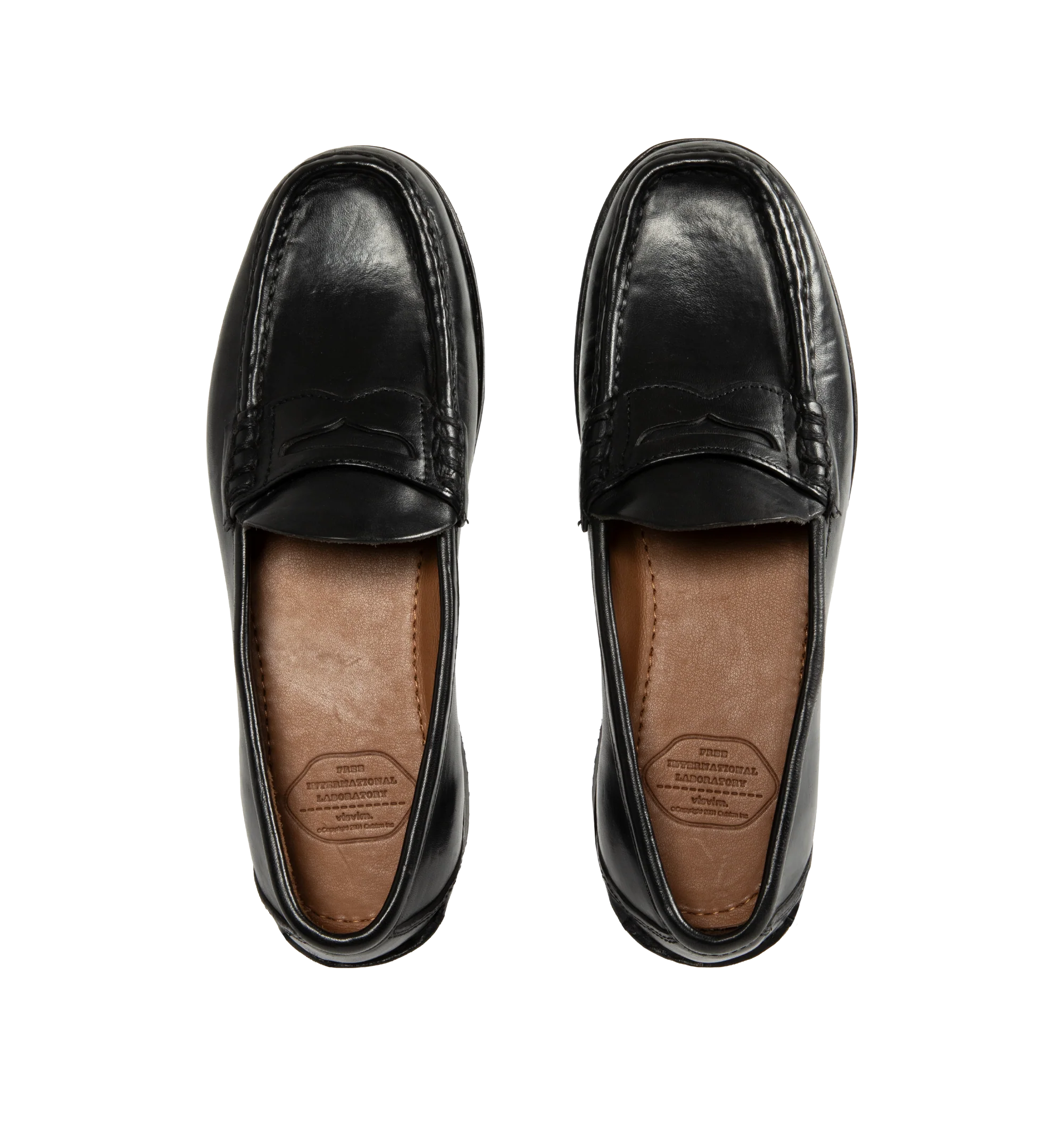 Image 4 of 4 - BLACK - Visvim Men's Fabro-Folk Leather Loafers are crafted from Italian vegetable-tanned horsehide and feature a minimalist penny loafer silhouette with hand-sewn construction and Goodyear-welted detailing. Designed with a pigment-free leather lining, natural cork insole, leather welt and midsole, and a Vibram outsole for lasting comfort, durability, and resoling capability. Main Material: Italian Vegetable-Tanned Horsehide. Lining: Pigment-Free Leather. Insole: Natural Cork. Midsole: Leathe