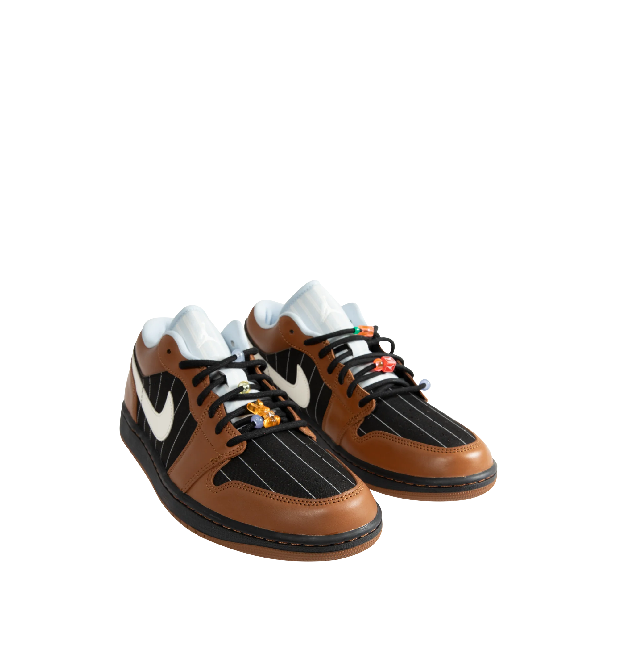 Image 2 of 5 - BROWN - Men's Air Jordan 1 Low SE Sneakers feature a genuine leather and suede upper with the iconic low-top silhouette, signature Wings branding, and a Jumpman logo for a premium take on a timeless classic. These lifestyle sneakers combine encapsulated Air-Sole cushioning with a durable rubber outsole for lightweight comfort, lasting support, and reliable everyday traction. Main Material: Genuine Leather and Suede. Midsole: Encapsulated Air-Sole Unit. Sole: Rubber.