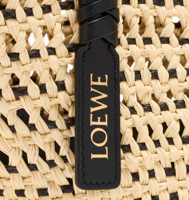 Image 6 of 6 - NEUTRAL - LOEWE PAULA'S IBIZA Small Braid Basket Bag in iraca palm and calfskin featuring shoulder carry, calfskin tie closure, unlined, removable Anagram Pebble dice and gold embossed LOEWE. Iraca palm/calf. 18 cm x 36 cm x 13 cm. Made in Spain.