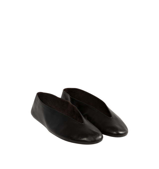 Image 2 of 4 - BLACK - The Row women's slip-on shoe in soft nappa leather with oval toe, notched v-opening, and flexible rubber-coated sole. 100% Lambskin Leather. Made in Italy.