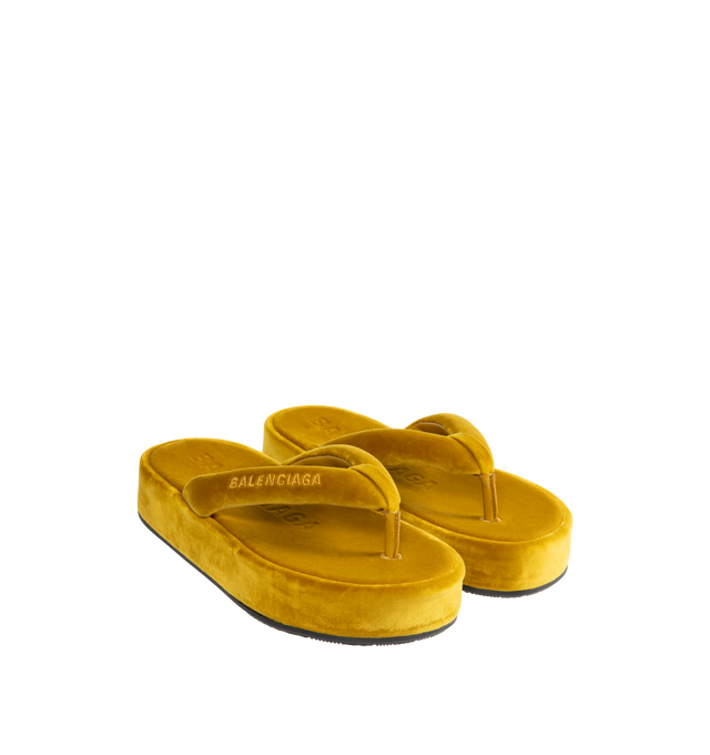Image 2 of 4 - YELLOW - BALENCIAGA Jet Lag Thong featuring cotton, viscose and elastane, thong sandal, rounded toe, 50mm platform height, padded upper, Balenciaga logo embroidered on the upper of the right foot, Balenciaga logo debossed on the insole, tone-on-tone sole and black outsole. Upper: cotton, viscose, elastane. Sole: TPU. Insole: cotton, viscose, elastane. Made in Italy.