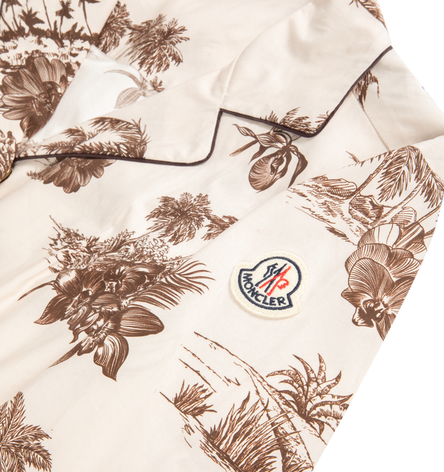 Image 2 of 2 - MULTI - MONCLER Floral Knee Length Shirt Dress featuring cotton poplin, cotton yoke lining, collar, long sleeves, snap button closure, waistband with drawstring fastening and front patch pockets. 100% cotton. Made in Hungary. 