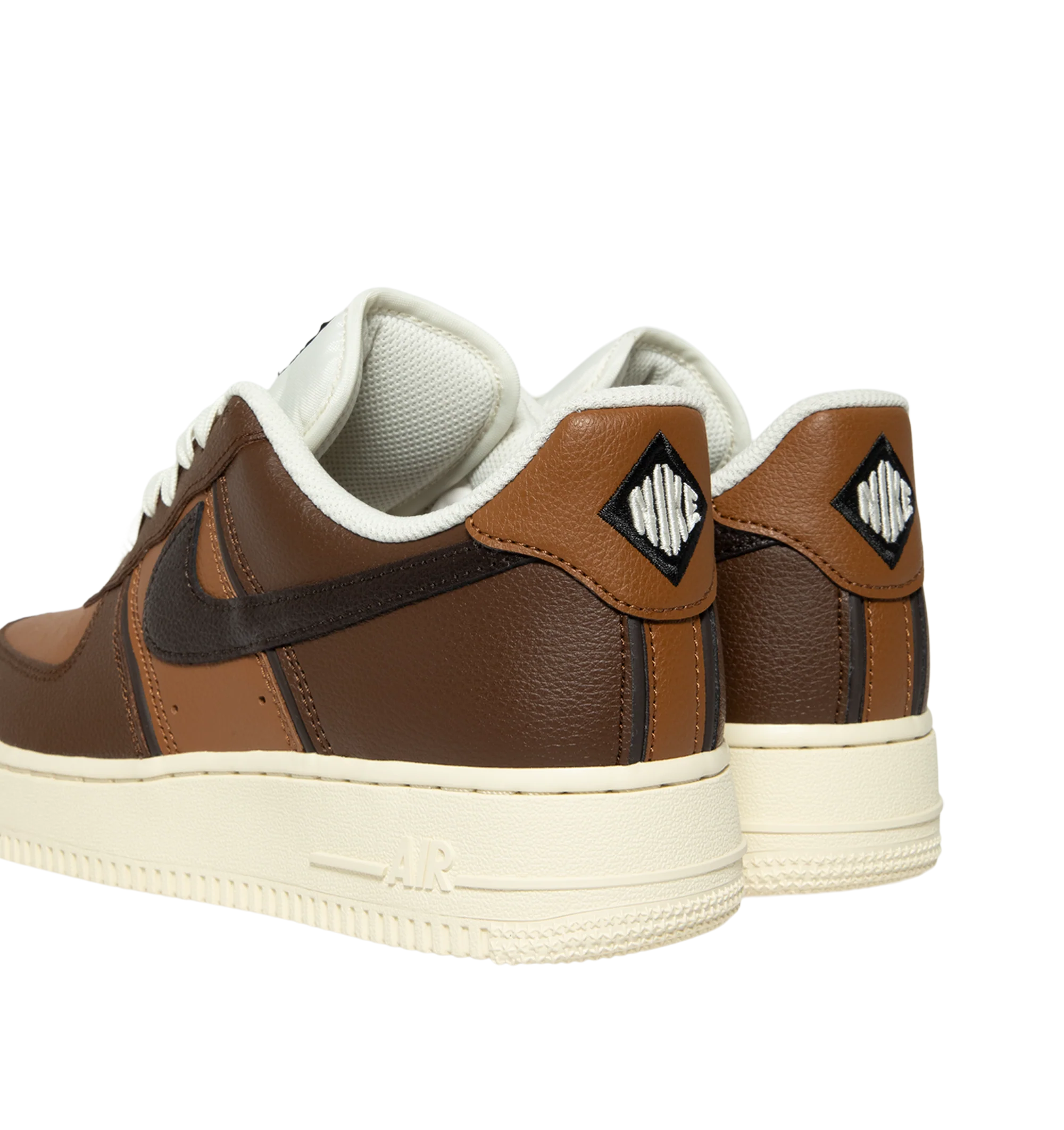 Image 3 of 5 - BROWN - Nike Men's Air Force 1 '07 LV8 Sneaker featuring classic silhouette with genuine and synthetic leather upper with perforated toe box, Nike Air unit, rubber outsole with classic pivot circles and padded collar. 