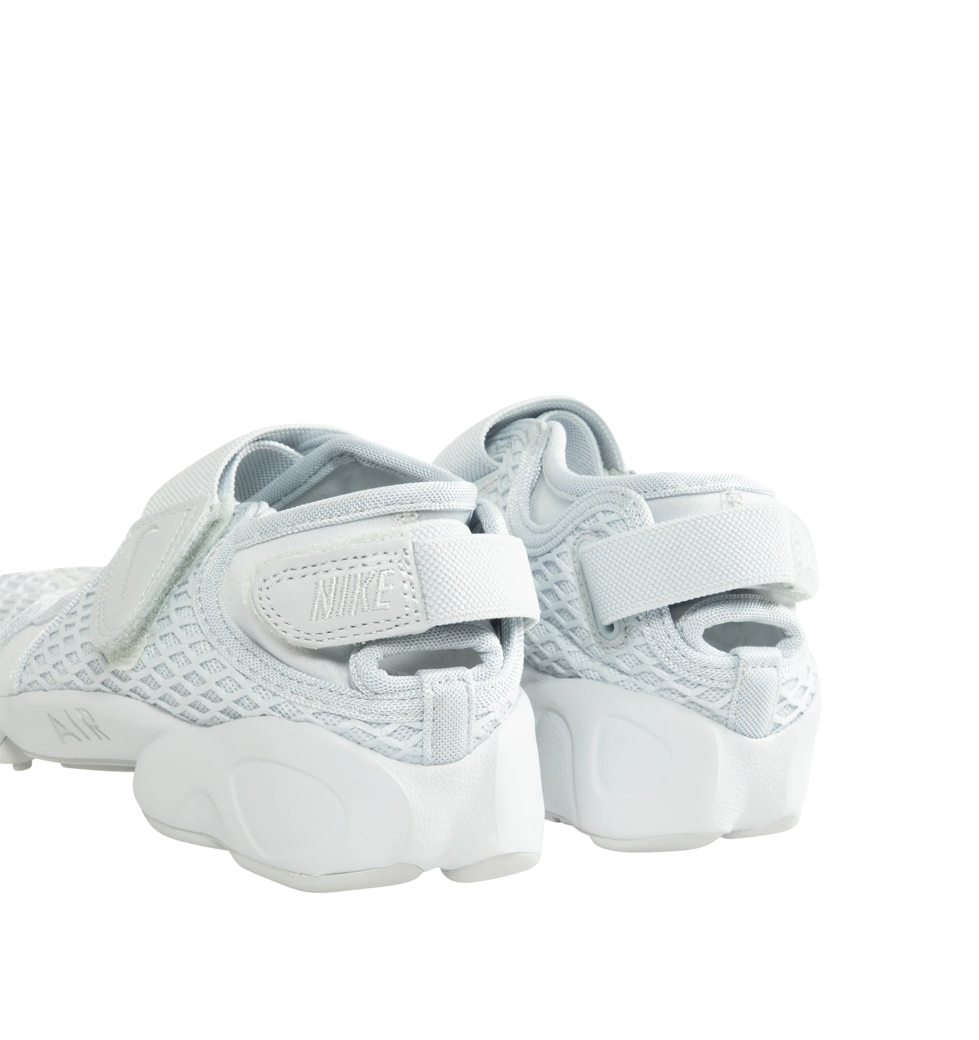 Image 3 of 5 - WHITE - Nike Women's Air Rift Sneaker featuring hook-and-loop straps on the midfoot and heel, Nike Air unit in the heel combined with plush foam, rubber detailing on the outsole, upper features a blend of elastane, polyester and nylon materials for a flexible fit and split toe design.