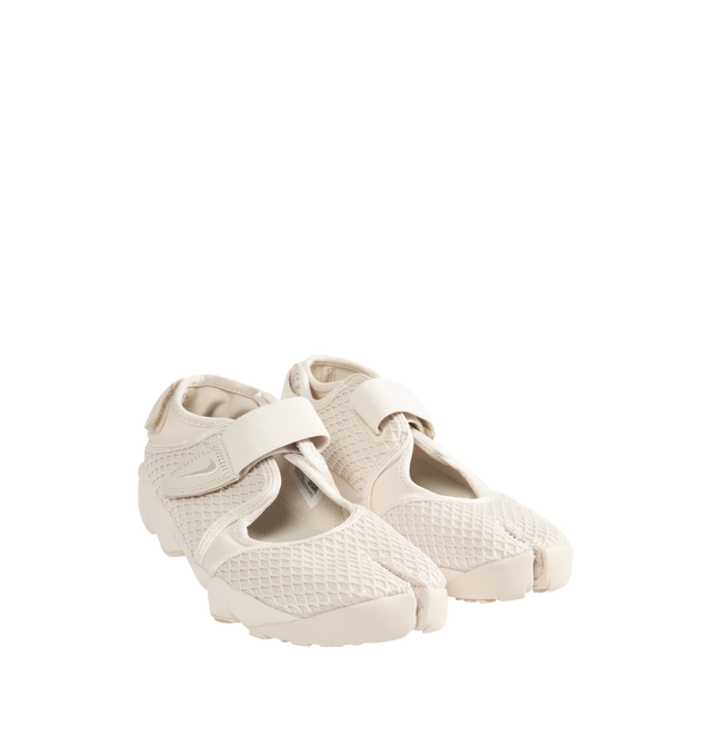Image 2 of 5 - WHITE - NIKE Air Rift Shoe featuring mixed textile upper, hook-and-loop straps, Nike Air unit in the heel, foam midsole and rubber detailing on the outsole with rugged tread.