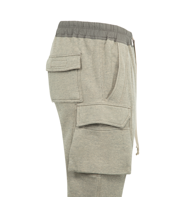 Image 3 of 3 - GREY - DRKSHDW Mastodon Tapered Cotton-Blend Jersey Sweatpants featuring slim tapered legs, elastic waist with elongated drawstrings, low-crotch style and cargo pockets. 84% cotton, 16% polyester. Made in Italy.