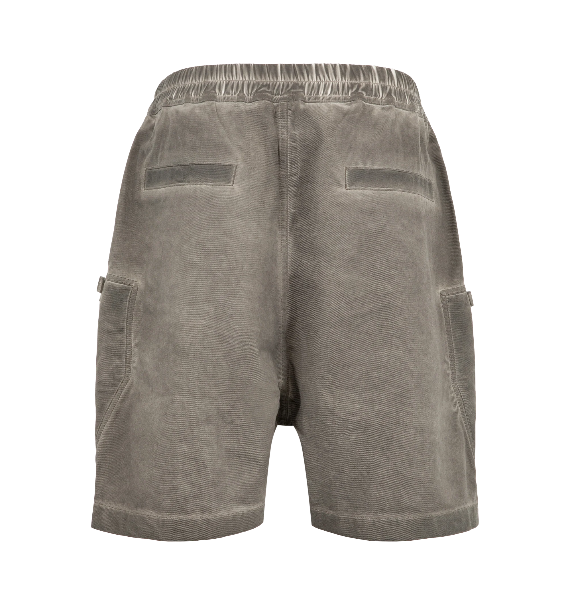 Image 2 of 3 - GREY - Rick Owens Drkshdw Men's Bauhaus Shorts are crafted from 100% cotton 13oz Lido Wash denim and feature a knee-length silhouette with a low dropped crotch. Designed with an elasticized waistband and drawstring closure, these designer shorts include side pockets, signature round Bauhaus zip pockets at the front thigh, and a webbing tab with eyelet detailing. Back jet pockets complete the utilitarian design. The medium-weight denim is overdyed and stone washed to achieve an irregular, live