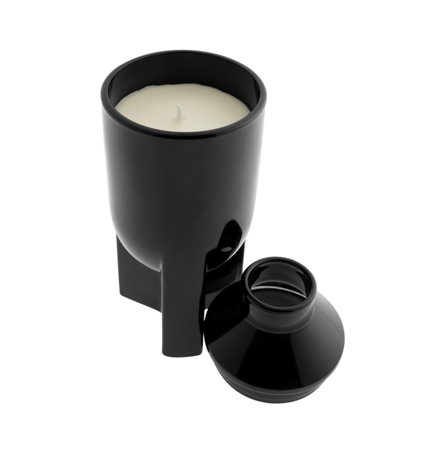 Image 2 of 2 - BLACK - RICK OWENS LApparition Candle Set featuring solid glass vessel in black with hand-poured scented wax candle, detachable chimney-style lid and logo etched at base. H8" x D3.5" / 200 g. Wax. Made in France.