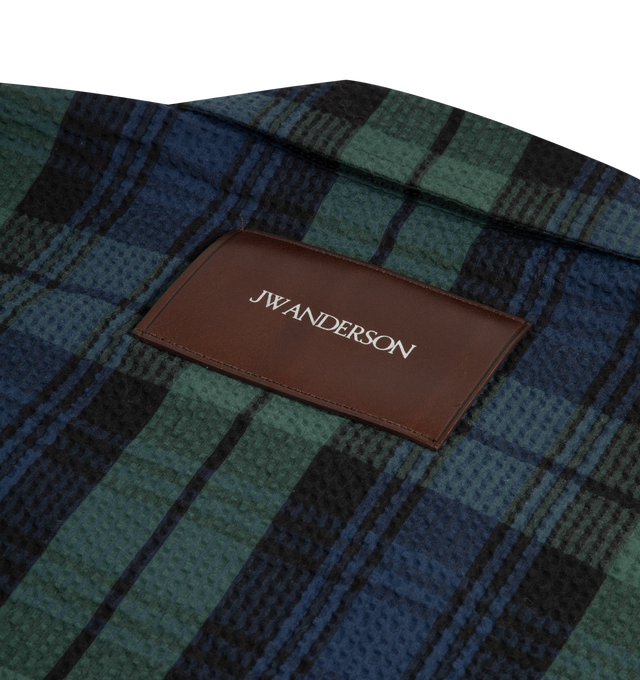 Image 2 of 2 - NAVY - JW Anderson Mens Front-Zip Blouson in navy and green cotton seersucker check. Vintage inspired, with a classic fit, crafted in a specially developed black watch tartan on a seersucker base. Features welt pockets and elasticated cinch panels at the back. Unlined, finished with horn buttons on the cuff. 100% Cotton. Made in Portugal.
