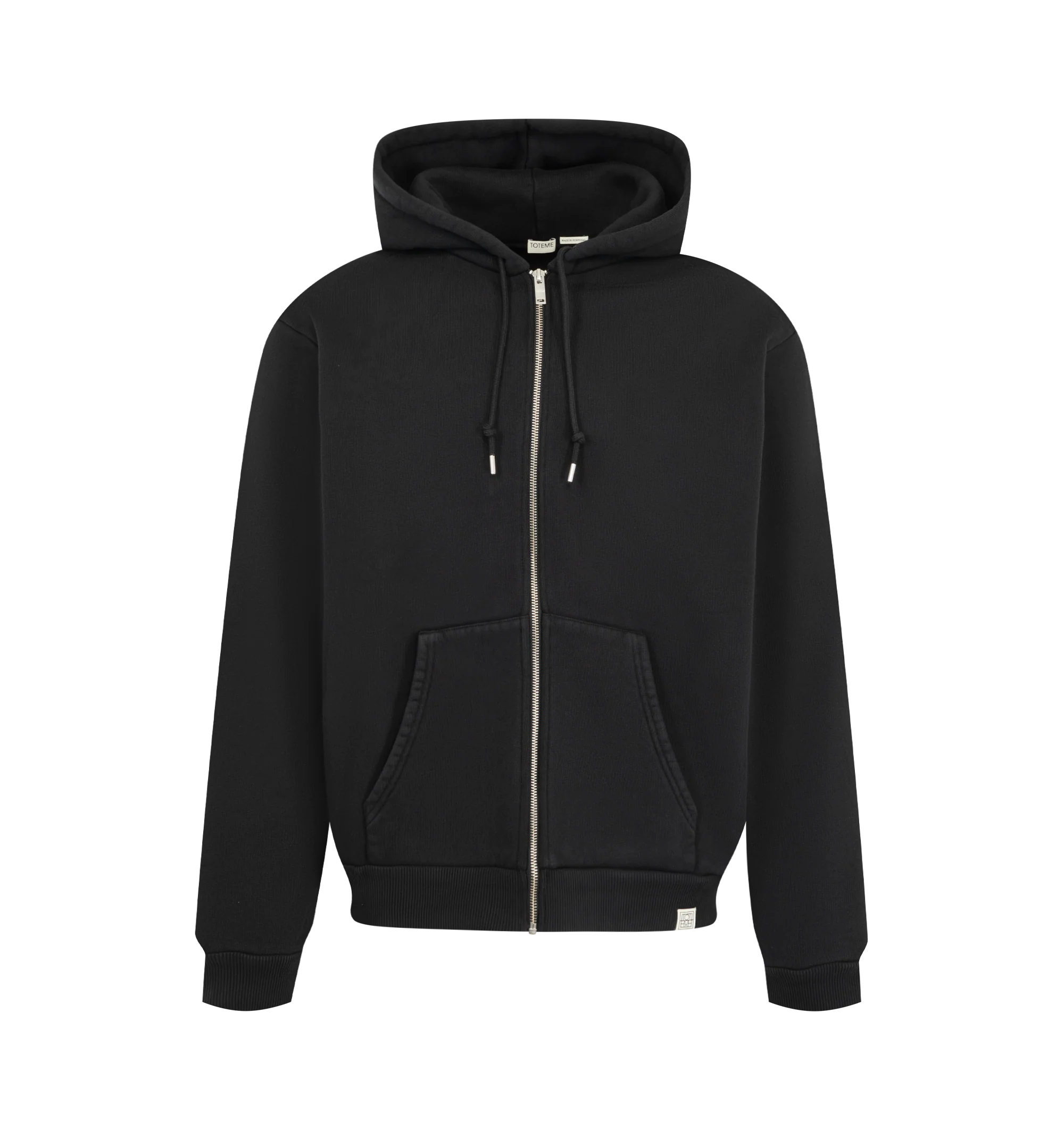 Image 1 of 2 - BLACK - Toteme Men's Zip Hoodie is crafted from cotton fleece and features a relaxed silhouette. Designed with a drawstring hood and front zip closure, this elevated essential is finished with silver-tone hardware and a signature monogram tab at the hem. Main Material: 100% Cotton.