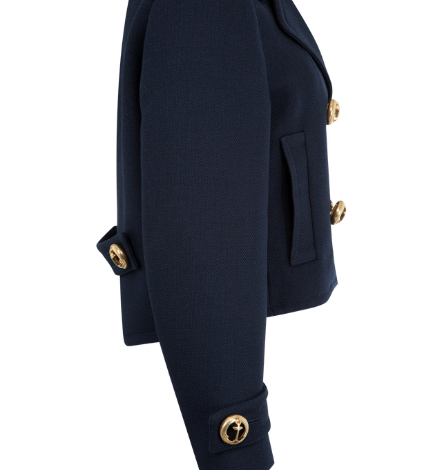 Image 3 of 3 - NAVY - BALENCIAGA Cropped Peacoat in textured wool featuring cropped fit, wide notch lapel, 4-button double-breasted front, gold-toned anchor buttons, button-tab sleeves and 2 welt pockets. 100% wool. Lining: 100% viscose. Made in Italy.