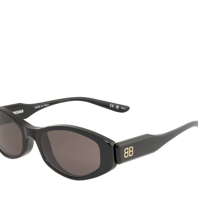 Image 3 of 3 - BLACK - BALENCIAGA Nova Oval Sunglasses featuring Eastman Acetate Renew (40% bio-based, 27% recycled), oval shape, standard fit and BB logo metal plate on both temples. Lens material: Bio-Nylon. 100% UVA/UVB protection. Acetate. Made in Italy.